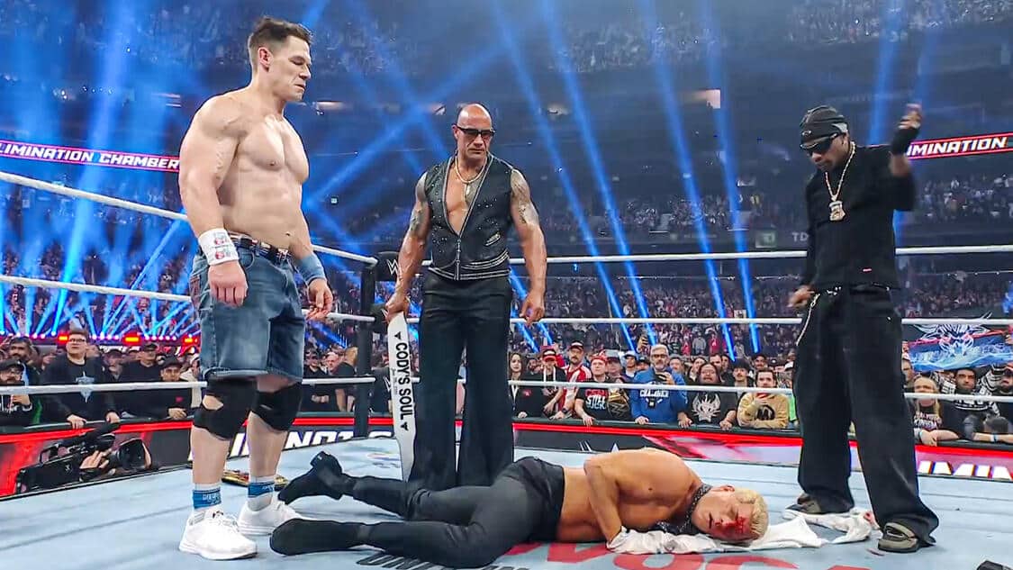 John Cena and The Rock "The Final Boss" stand over Cody Rhodes after Cena's epic Heel Turn